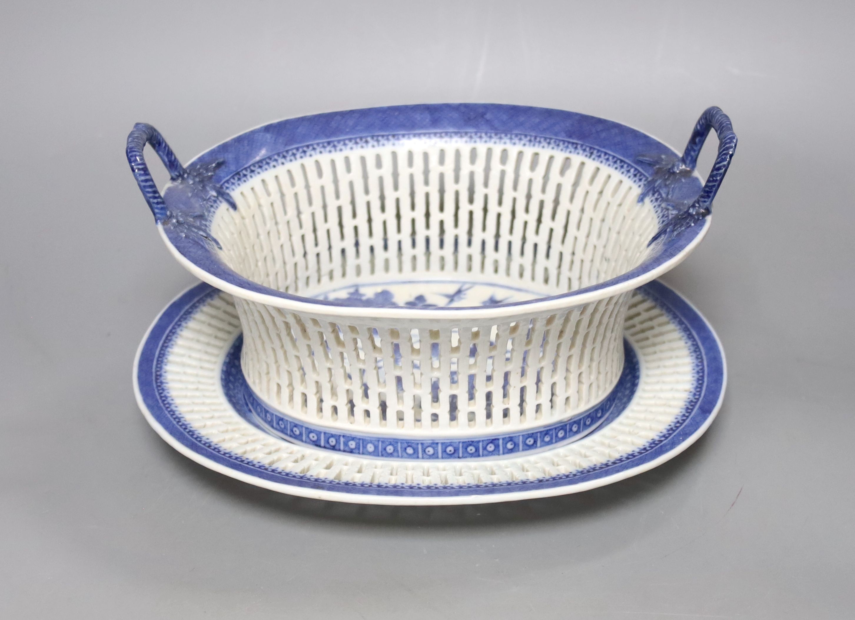 A Chinese blue and white chestnut basket and stand, Qianlong period, basket 11 cms high.